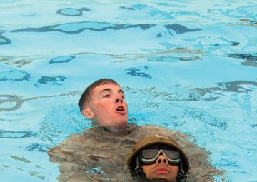 Marines swim through challenging water-rescue course