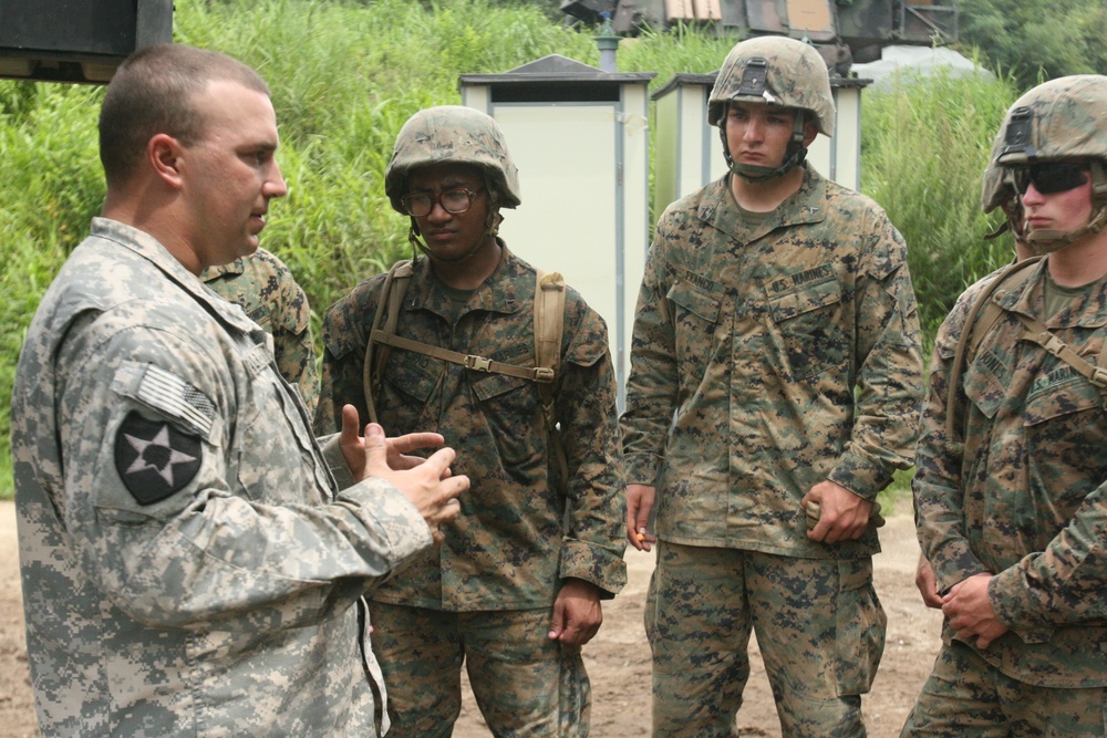 Marines learn how Army artillery operates