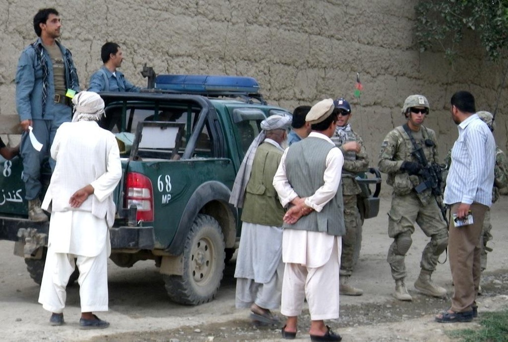 Team Rock distributes radios to Afghans