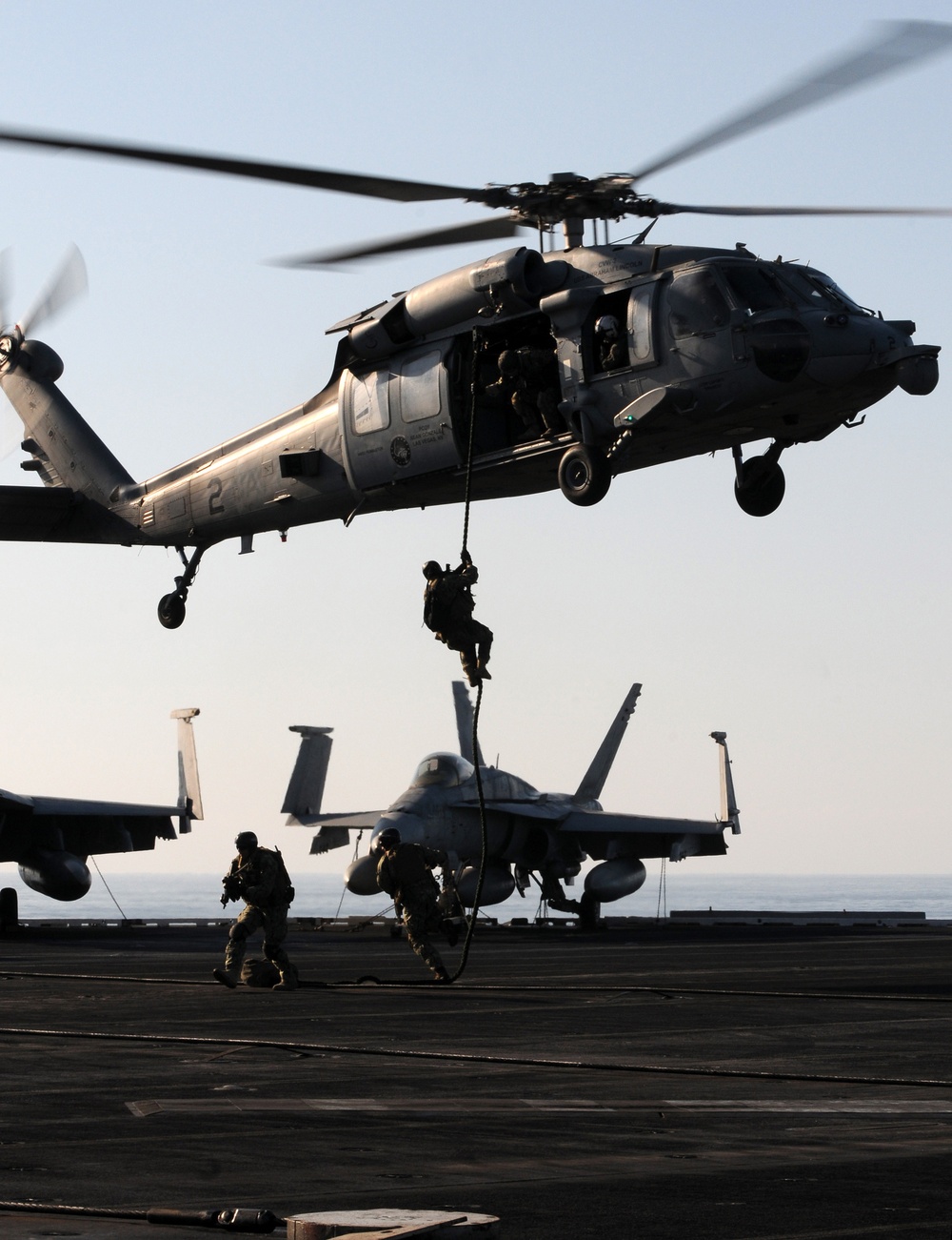 Dropping out of an MH-60S Sea Hawk helicopter