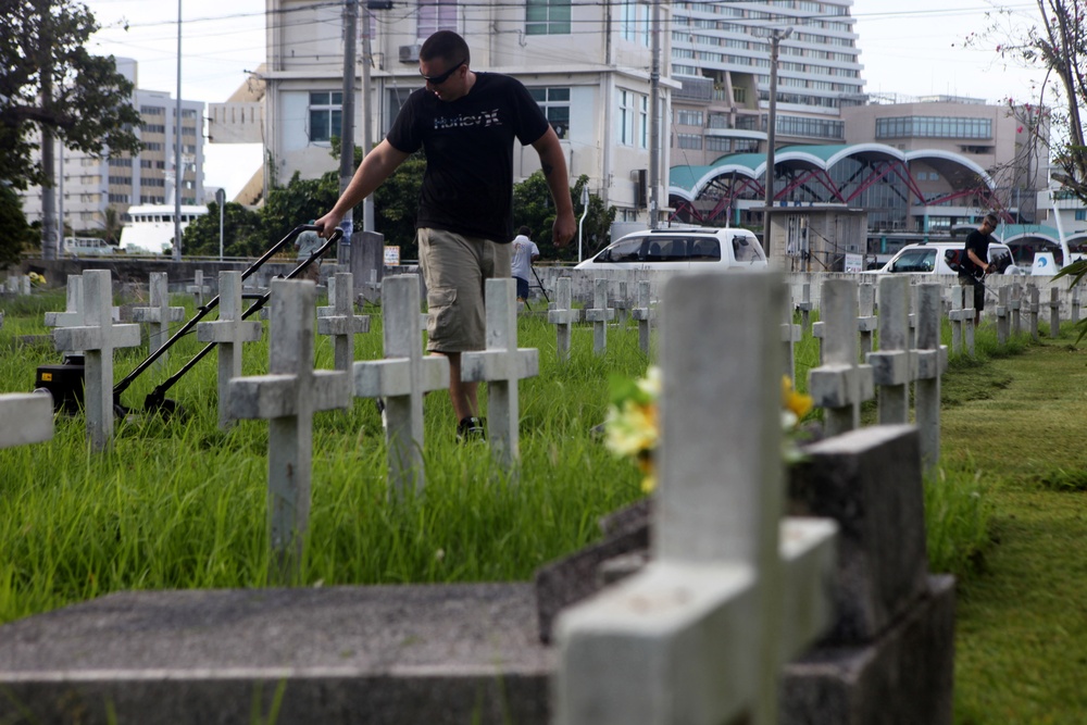 Service members, civilians revitalize forgotten international cemetery