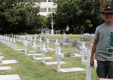 Service members, civilians revitalize forgotten international cemetery