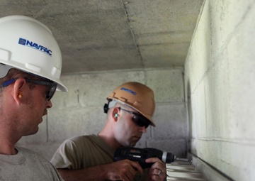 Service members, civilians revitalize forgotten international cemetery