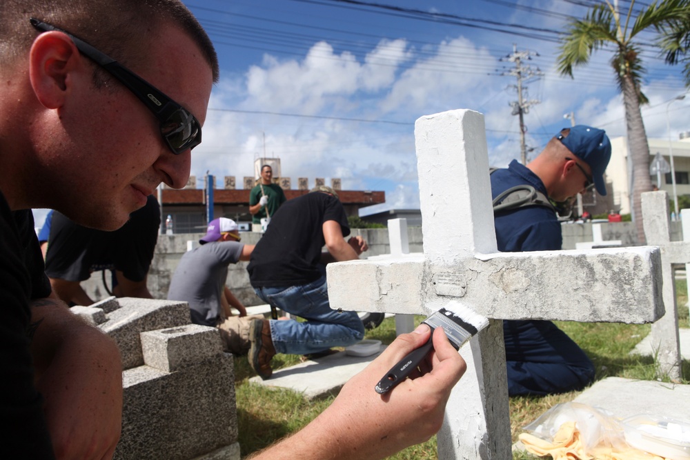 Service members, civilians revitalize forgotten international cemetery