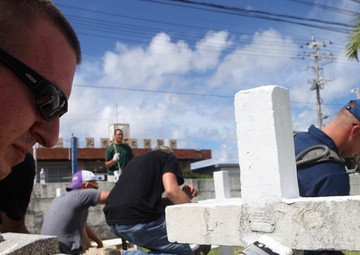 Service members, civilians revitalize forgotten international cemetery