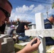Service members, civilians revitalize forgotten international cemetery