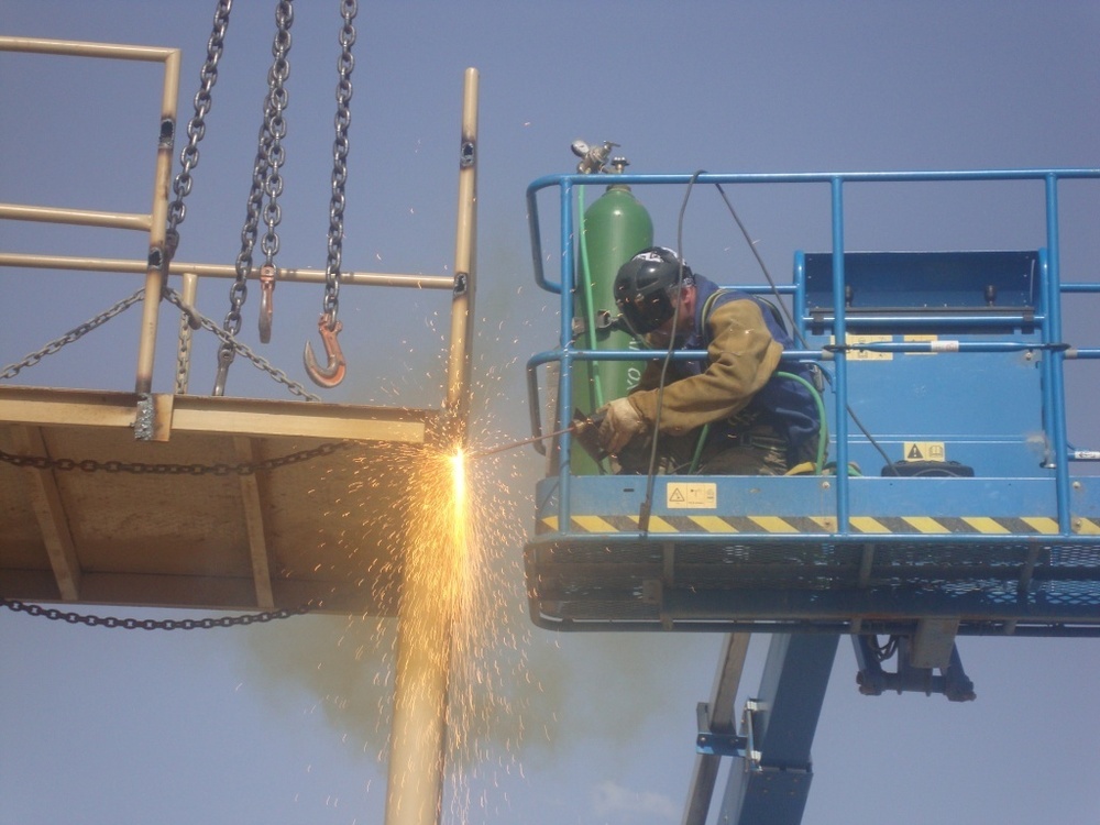 Soldier removes support beam