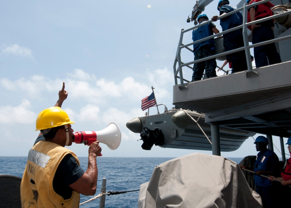 USS Underwood sailor at work