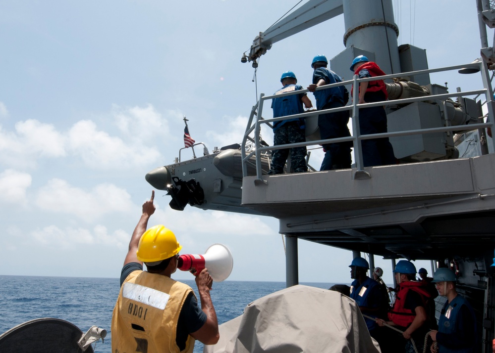 USS Underwood sailor at work
