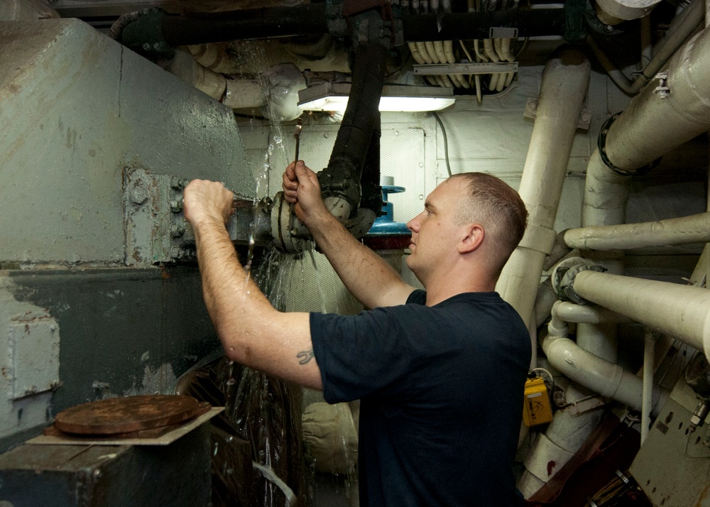 USS Underwood sailor at work
