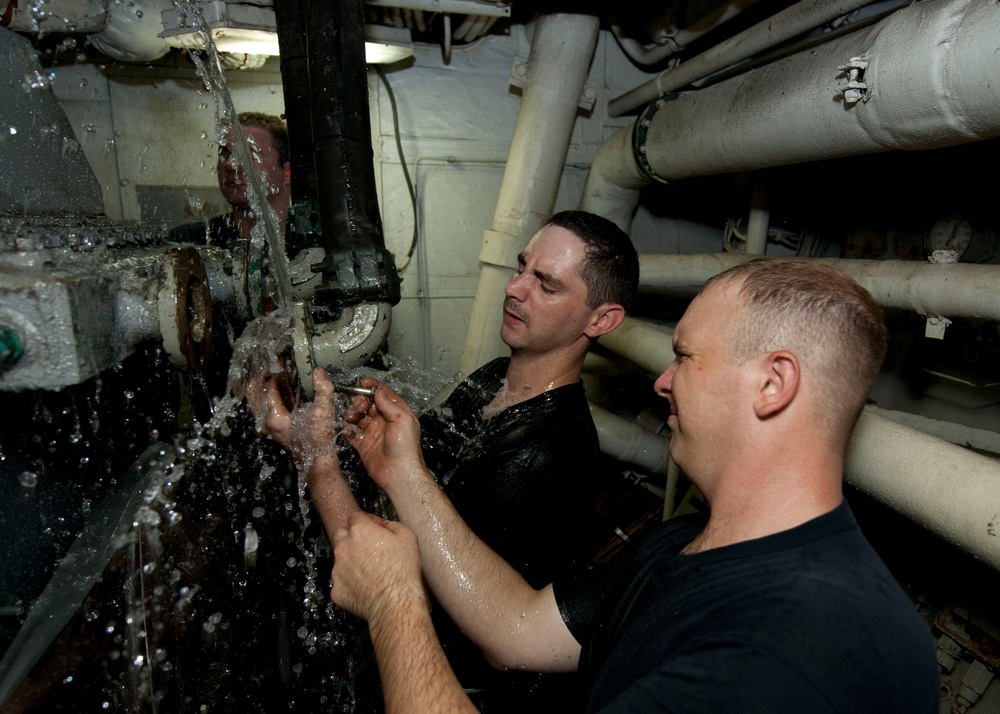 USS Underwood sailor at work