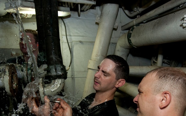 USS Underwood sailor at work