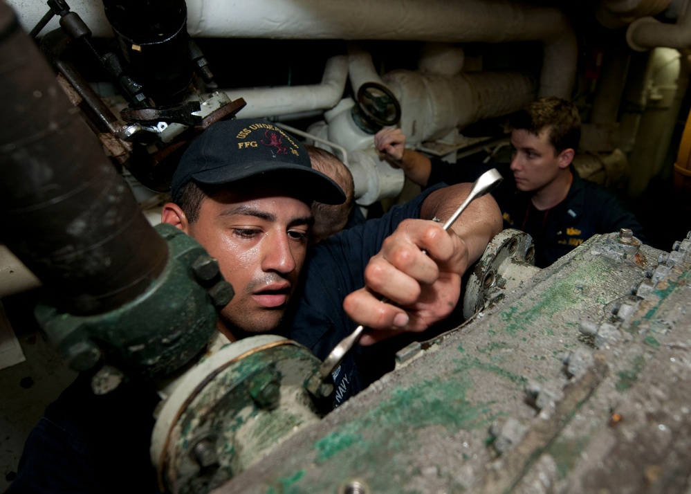 USS Underwood sailor at work