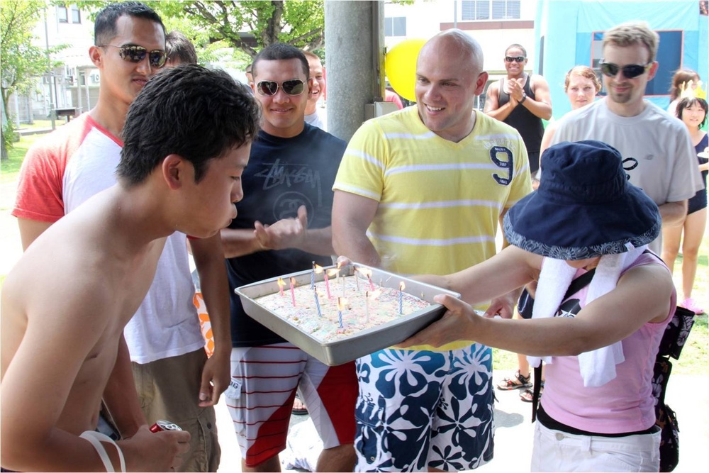 Station volunteers assist, host children's home