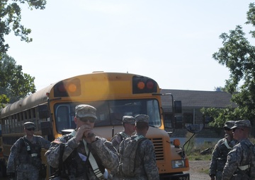 Military policemen, medics evacuate role-players during exercise