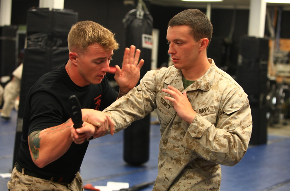 Religious program specialist earns martial arts instructor tab