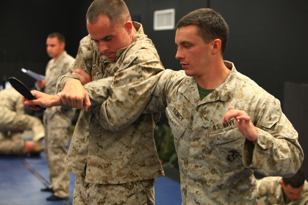 Religious program specialist earns martial arts instructor tab