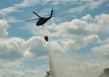 UH-60 Black Hawk trains on Bambi Buckets