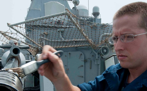 Cleaning the barrel of a 25 mm chain gun