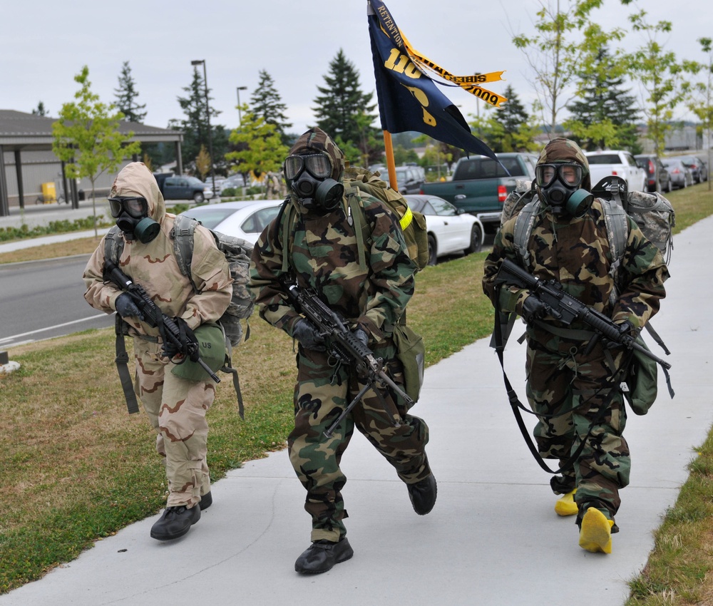 Chemical Soldiers march in familiar attire