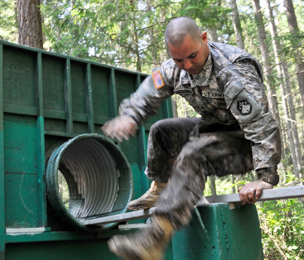 Soldiers traverse obstacles
