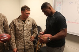 Former professional football player visits Explosive Ordnance Disposal Technicians