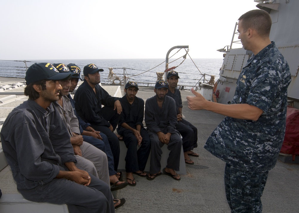 US Navy rescues 10 after Iranian ship catches on fire