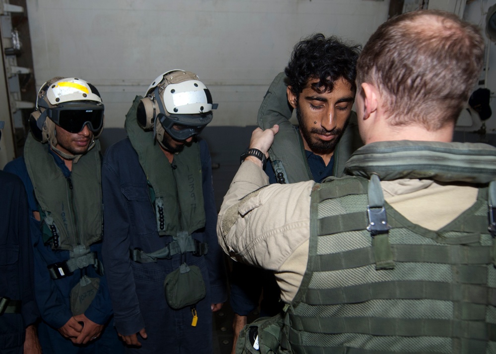 US Navy rescues 10 after Iranian ship catches on fire