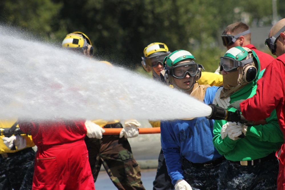 Practicing hose handling techniques