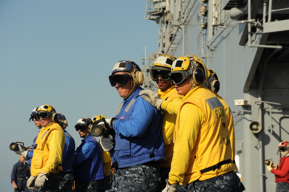 Performing flight deck firefighting drills
