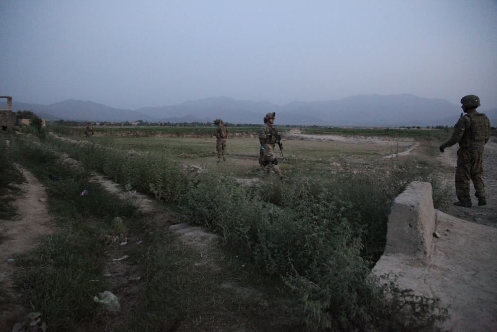 Searching pump house for weapons caches