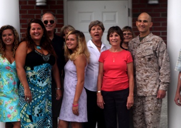 Families pose for a picture