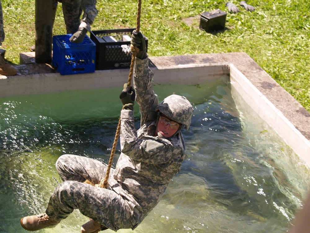 Soldiers of the 527th Military Police Companyconduct a water crossing as part of a Leader Reactionary Training Course TSC Ansbach.