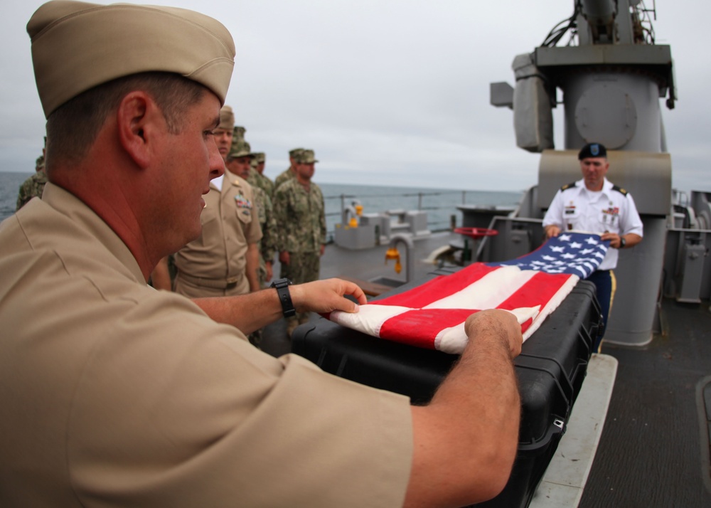 US Navy divers search for the remains of 5 un-accounted for service members from 1942