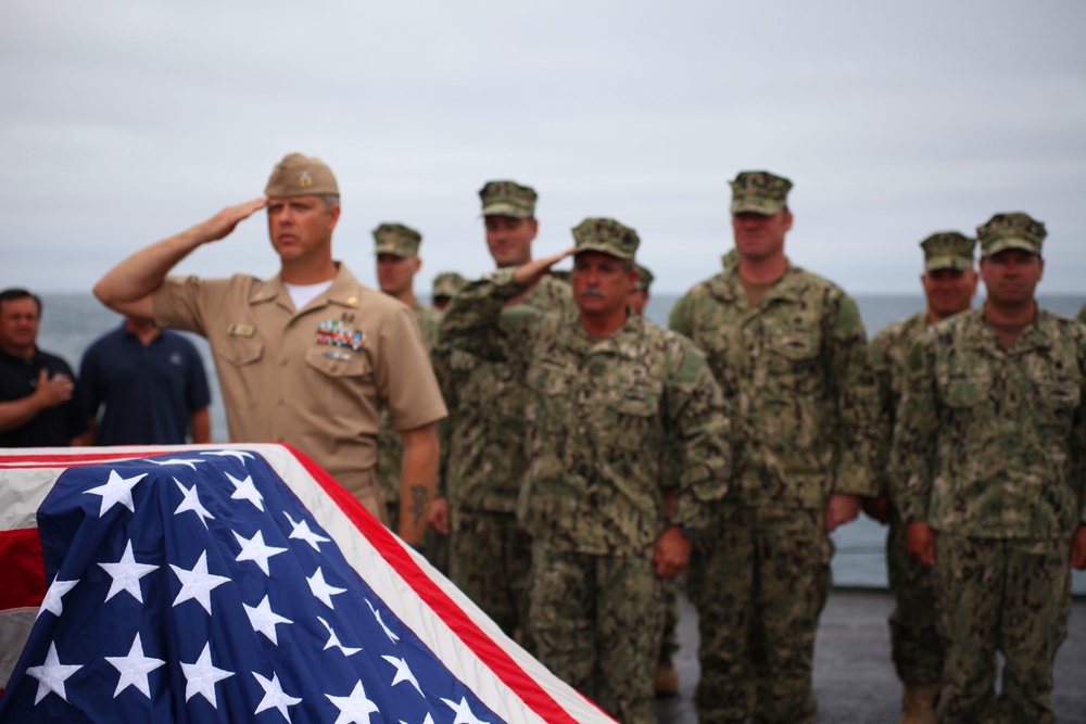 US Navy divers search for the remains of 5 un-accounted for service members from 1942