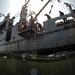 U.S. Navy divers search for the remains of 5 un-accounted for servicemembers from 1942.