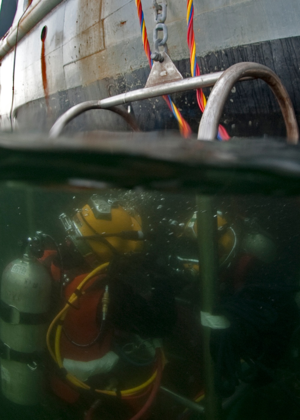 US Navy divers search for the remains of 5 un-accounted for service members from 1942