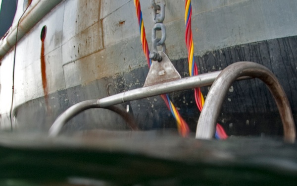US Navy divers search for the remains of 5 un-accounted for service members from 1942