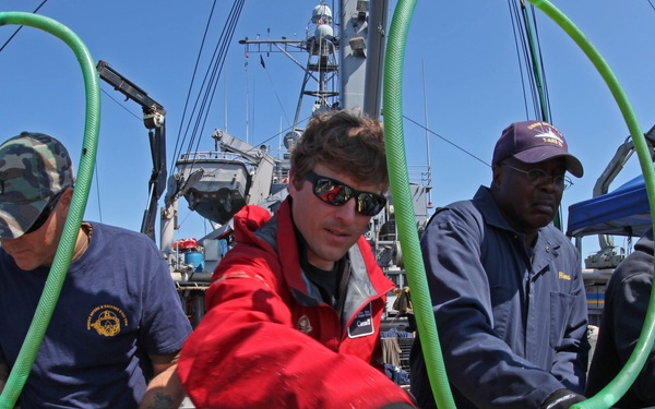 US Navy divers search for the remains of 5 un-accounted for service members from 1942