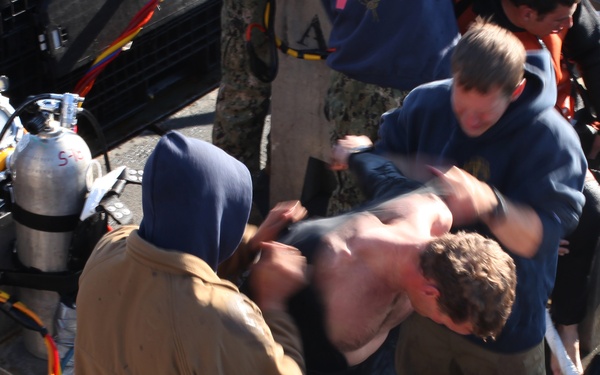 US Navy divers search for the remains of 5 un-accounted for service members from 1942