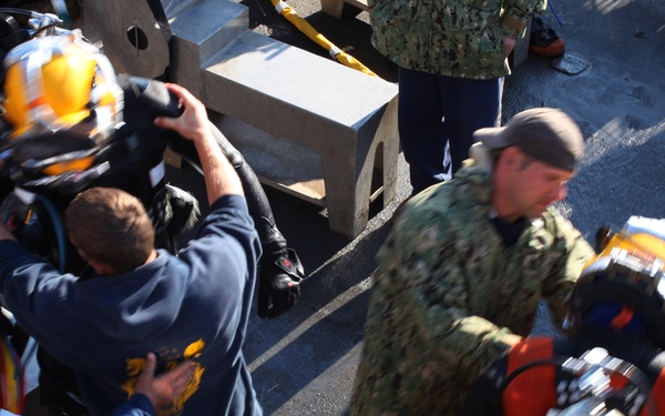 US Navy divers search for the remains of 5 un-accounted for service members from 1942