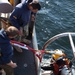 US Navy divers search for the remains of five un-accounted for service members from 1942