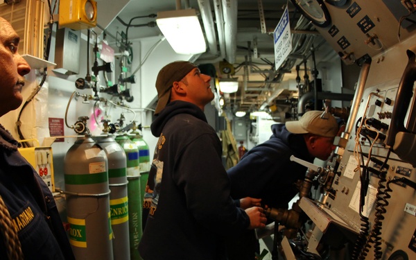US Navy divers search for the remains of 5 un-accounted for service members from 1942