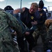 US Navy divers search for the remains of five unaccounted for service members from 1942