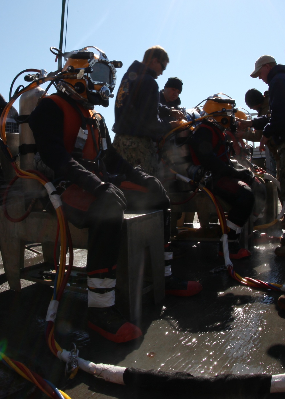 US Navy divers search for the remains of five unaccounted for service members from 1942