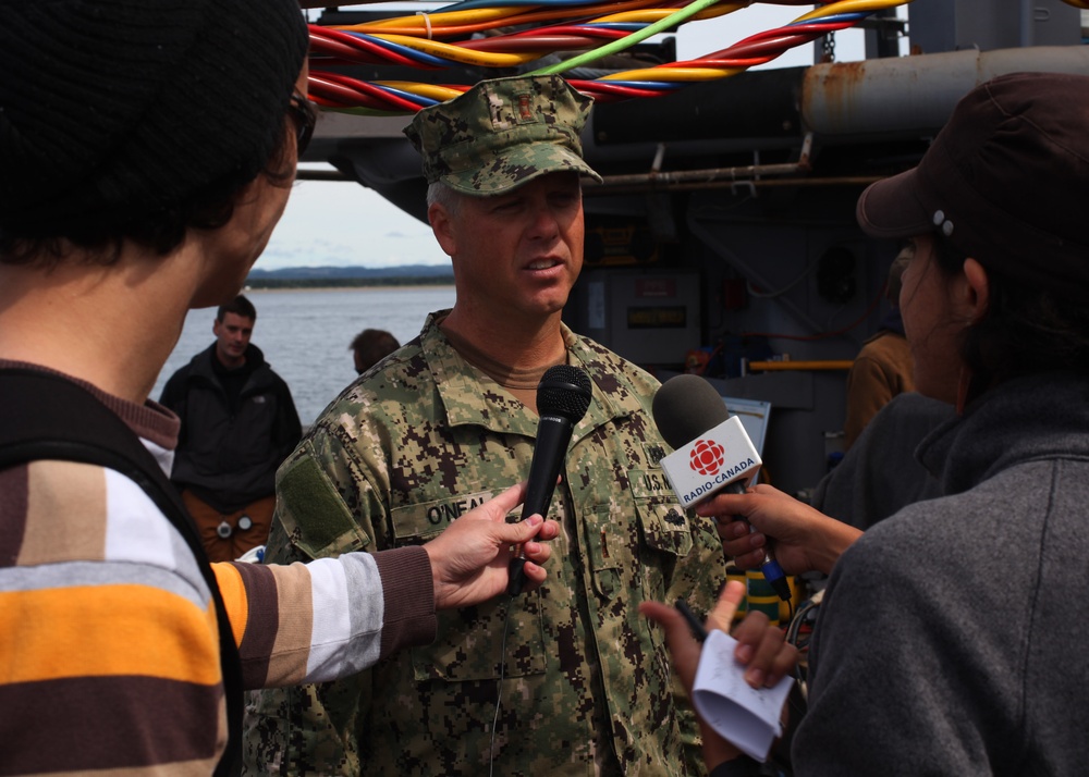 US Navy divers search for the remains of five unaccounted for service members from 1942