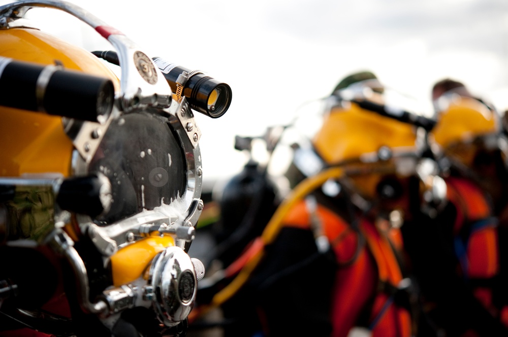 US Navy divers search for the remains of 5 un-accounted for service members from 1942