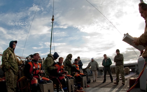 US Navy divers search for the remains of 5 un-accounted for service members from 1942