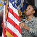 Airman adjusts flag