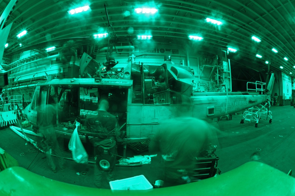 Marines conduct helicopter maintenance